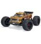 A gold and black Arrma 1/10 OUTCAST 4S 4X4 RTR Brushless Stunt Truck with large tires and a detailed body design designed for off-road performance