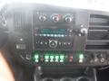 Dashboard of a 2016 Chevrolet Express featuring various controls and display lights