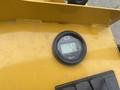 Display screen showing operating hours and metrics for a 2024 AGT KRW 23 Mini loader