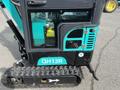A 2024 AGT Industrial Green QH13R Mini Excavator with a black and teal exterior featuring an open side panel and a track base for mobility