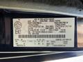 2011 Ford Econoline with a vehicle identification number label displaying specifications and manufacturing details
