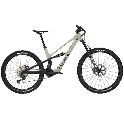 2025 Canyon Spectral:ONfly CF 9 Mountain Bike featuring a light gray frame with black accents wide tires and a rear suspension system