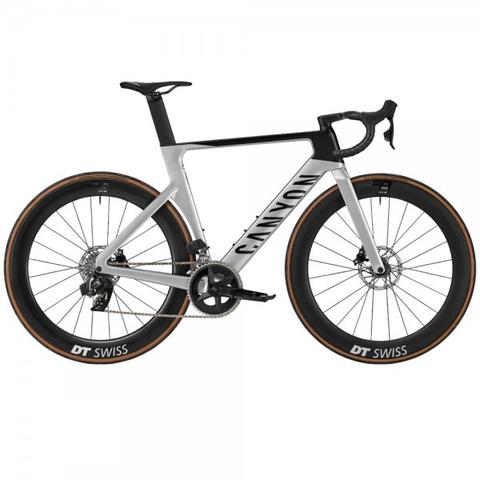 2024 Canyon Aeroad CF SLX 7 AXS Road Bike featuring a sleek design with a black and white color scheme and aerodynamic frame paired with DT Swiss wheels