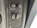 Control panel of a 2014 Toro Groundmaster 5910 featuring knobs and switches for adjusting settings
