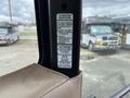 A label on the interior of a 2014 John Deere 1585 Terrain Cut detailing safety and operational guidelines for the equipment