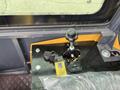 Controls and dashboard of a 2024 AGT Industrial Yellow H13R Mini Excavator featuring a key ignition and various operational levers