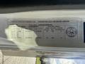 A label on a 2014 Hino 195 truck detailing specifications such as weight limits and tire sizes