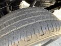 A close-up of a tire on a 2016 Chevrolet Silverado 2500HD showing detailed tread pattern and texture