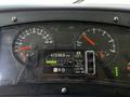 Dashboard of a 2022 Blue Bird BB Conventional showing speedometer fuel gauge and digital display with metrics like mileage and temperature