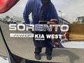 2015 Kia Sorento badge with the text Sorento AWD Kia West Coquitlam
