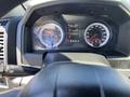 Dashboard of a 2015 RAM 1500 showing speedometer and tachometer with odometer reading 808 and various indicator lights