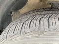 Close-up view of a tire from a 2015 Kia Sorento showing tread patterns and texture
