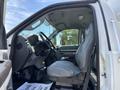 Interior view of a 2015 Ford F-750 showing the driver's seat dashboard and steering wheel
