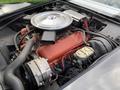 Close-up of a 1972 Chevrolet Corvette engine highlighting the air filter and engine components in a classic design