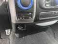 Control panel of a 2019 RAM 1500 Classic featuring knobs for air conditioning and buttons for four-wheel drive settings