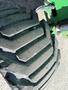 Close-up view of the tread on a large rubber tire used for a 2015 JLG 450AJ articulating aerial lift