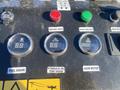 Control panel of a 2024 AGT KTT23 featuring gauges for fuel, oil temperature, and hydraulic oil temperature with buttons for hydraulic alarm and power indication