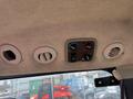 Interior control panel of a 2014 John Deere 1585 Terrain Cut with air vents and dials for adjusting temperature and airflow
