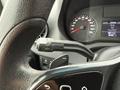 Close-up of the turn signal lever and dashboard display in a 2019 Mercedes-Benz Sprinter showing speed and mileage readings