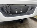 Rear view of a 2022 RAM 1500 Classic showing the hitch receiver and electrical connection points