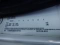 A label displaying weight specifications and details for a 2014 International Durastar including load capacities and vehicle identification information