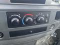 Dashboard controls of a 2008 Dodge Ram 5500 featuring knobs for climate control and air settings