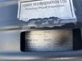 2005 Chevrolet Express with a label indicating previous visual inspection details including serial number and specifications
