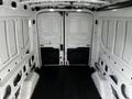 Interior of a 2020 Ford Transit van showing empty cargo space with white walls and a black rubber floor