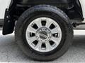 Close-up of the wheel of a 2020 Ford F-350 Super Duty showing the silver alloy rim and black tire with the brand name Toyo Tires prominently displayed