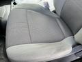A gray fabric seat in a 2017 Ford F-250 SD with a textured pattern and a slightly worn surface