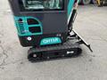 2024 AGT Industrial Green QH13R Mini Excavator with a compact design and tracked undercarriage for maneuverability