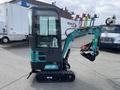 2024 AGT Industrial Green QH13R Mini Excavator with a compact design tracks and an enclosed operator's cabin