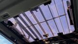 View of the skylight in a 2018 Caterpillar 326F L Excavator showcasing the interior structure and equipment details