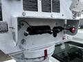 Close-up of a control panel with several levers and switches on a 2013 International DuraStar bucket truck