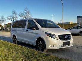 A 2022 Mercedes-Benz Metris van in white with black alloy wheels parked on a street