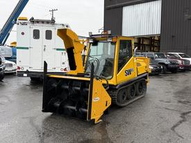 A yellow 2008 Camoplast SW 4S snowblower with a front-mounted auger and tracks designed for snow clearing and winter maintenance