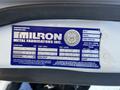 A label from a 2004 Freightliner M2 truck detailing manufacturer information and specifications including weight and model