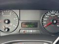 Dashboard of a 2007 Ford F-550 displaying speedometer, tachometer, and digital odometer reading 039927
