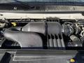 Close-up of the engine of a 2012 Ford Econoline E-450 showcasing the air intake and various engine components