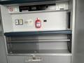2016 Chevrolet Express with a storage cabinet featuring control panels and safety equipment