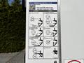 A 2021 Hino 338 vehicle featuring a user instruction panel with visual operation guidelines for raising and lowering a platform