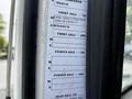 A label on a 2012 Autocar Xpert truck detailing axle specifications and capacities