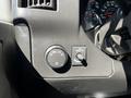 Control panel with headlight and dashboard light adjustment knobs in a 2019 Chevrolet Express