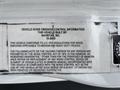 Vehicle noise emission control information label for a 2019 International 4300 detailing compliance with EPA regulations on noise emissions for medium and heavy-duty trucks