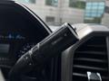 Close-up of the tow/haul switch on a 2017 Ford F-250 SD multi-function steering wheel control
