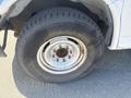 Close-up of a tire on a 2007 Chevrolet Express showing the wheel rim and tread pattern