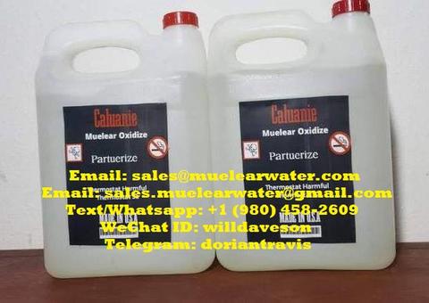Two white plastic containers of Caluanie Muelear Oxidize with labels indicating the product name and contact information for purchasing