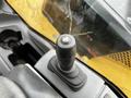 A close-up of the joystick control located in the cockpit of a 2024 Caterpillar 306 machinery
