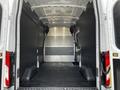 Interior view of a 2020 Ford Transit van showcasing a spacious cargo area with a flat floor and metal walls