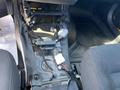 Close-up of the interior of a 2019 Dodge Charger showing exposed wiring and components around the center console and floor area